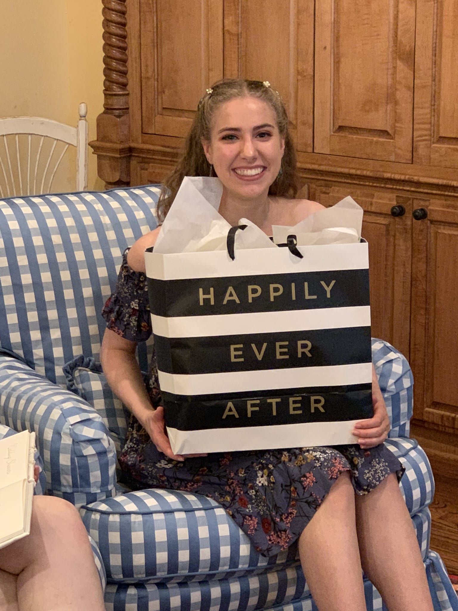 girl holding a wedding gift