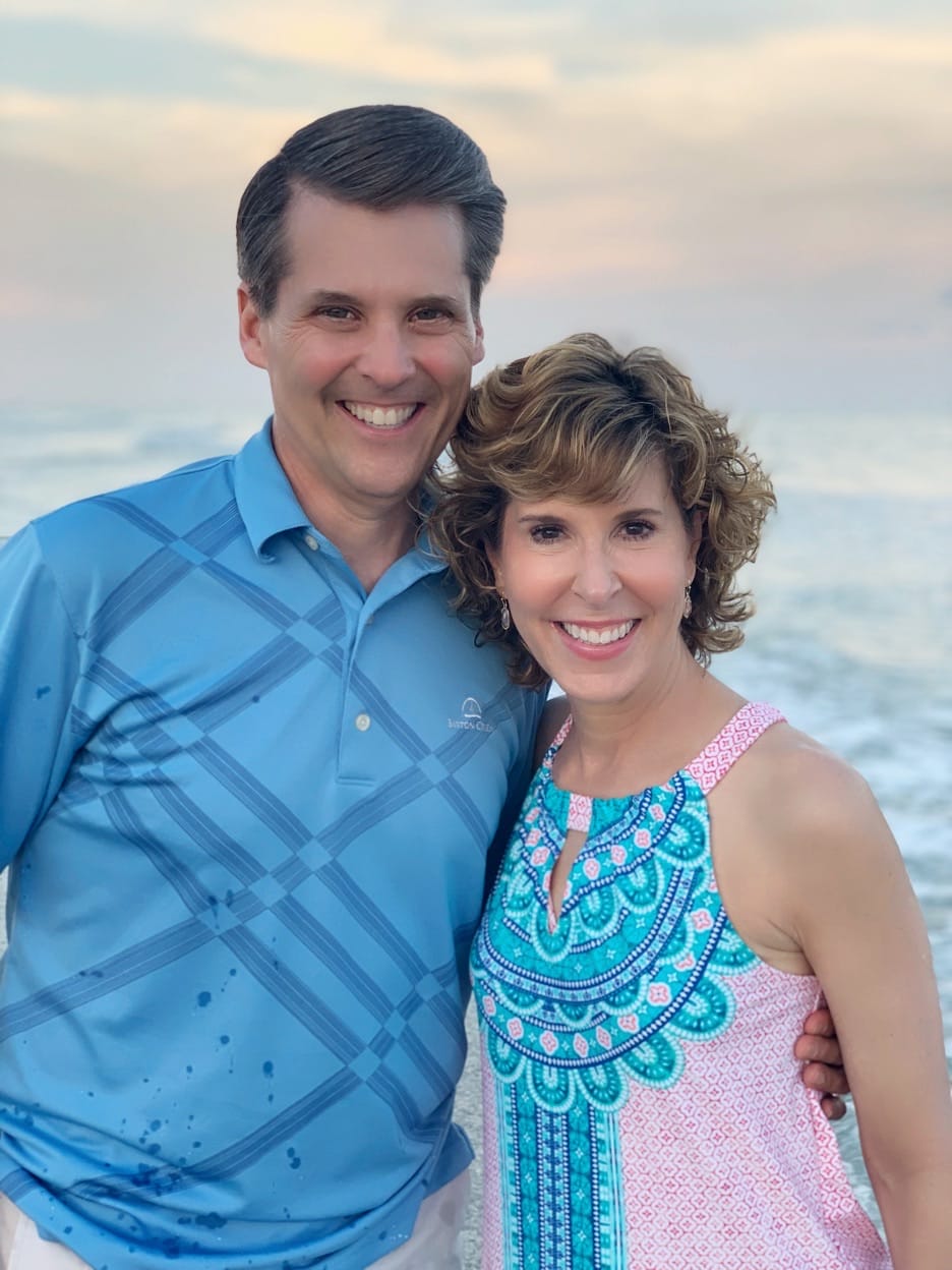 couple on the beach at sunset on sanibel island