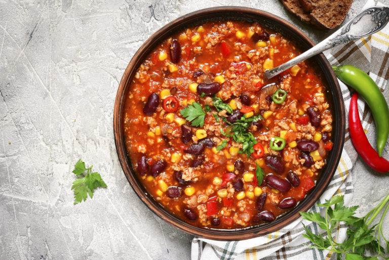 bowl of chili on white background