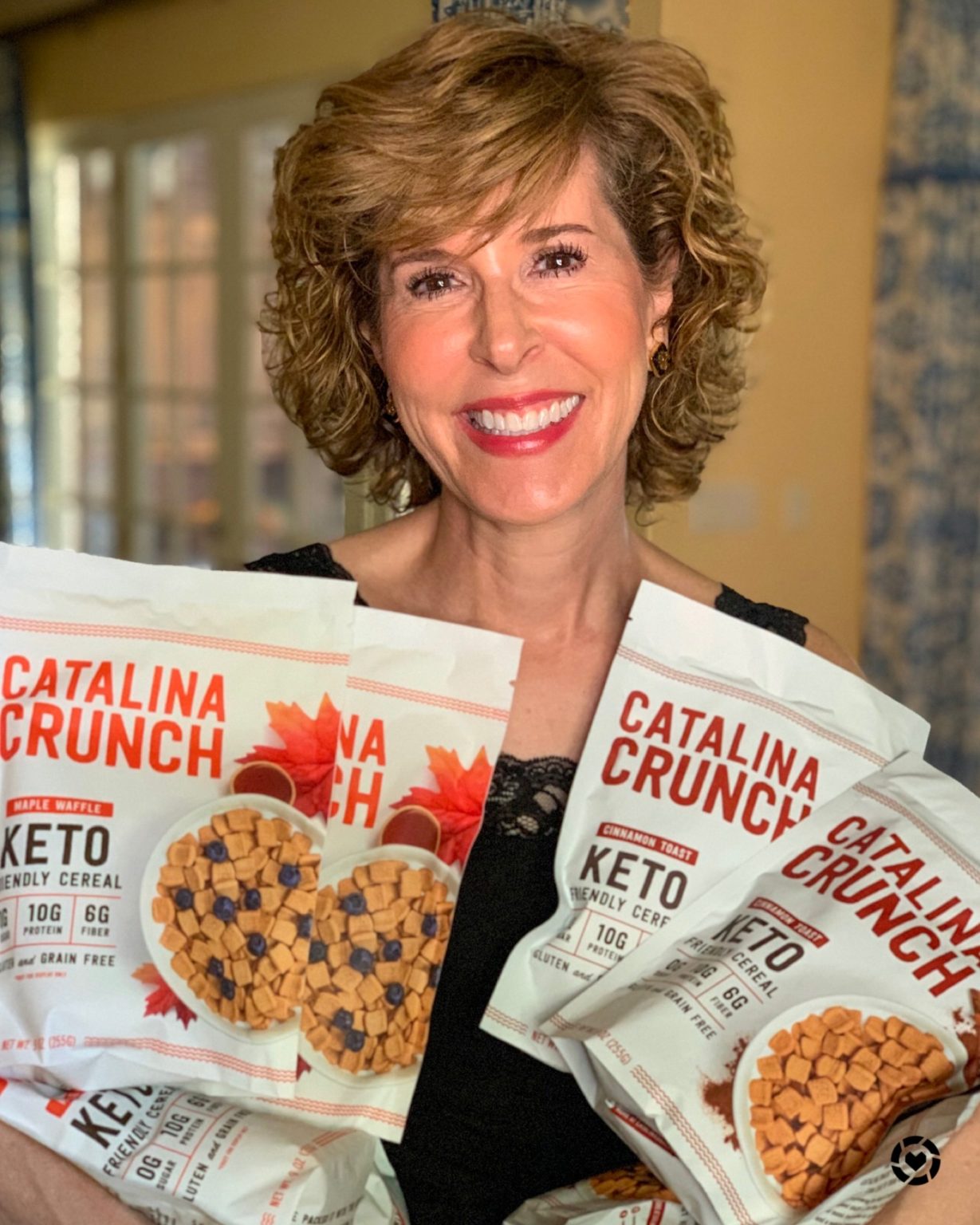 woman holding armfuls of catalina crunch cereal