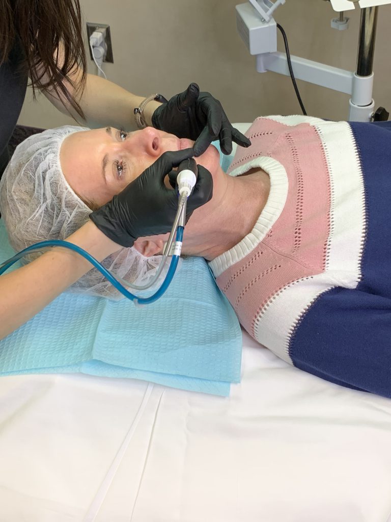 woman undergoing a HydraFacial