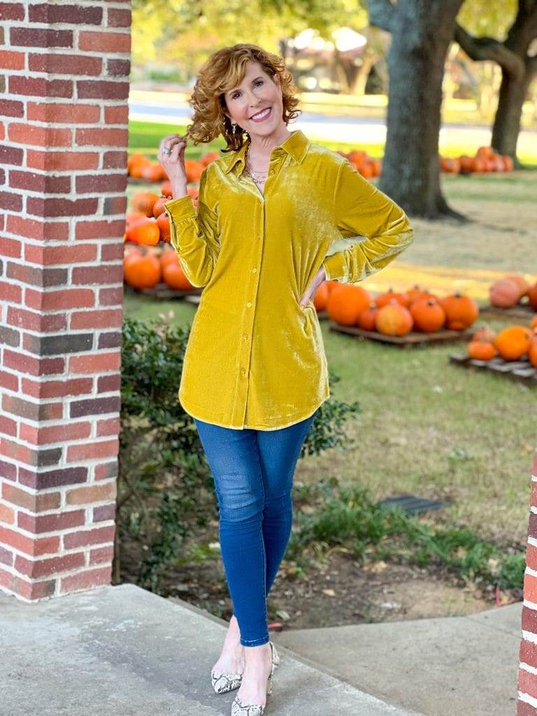 woman wearing soft surrondings icon collection velvet boyfriend shirt and Supremely Soft Relaxed Straight Jeans standing near pumpkins