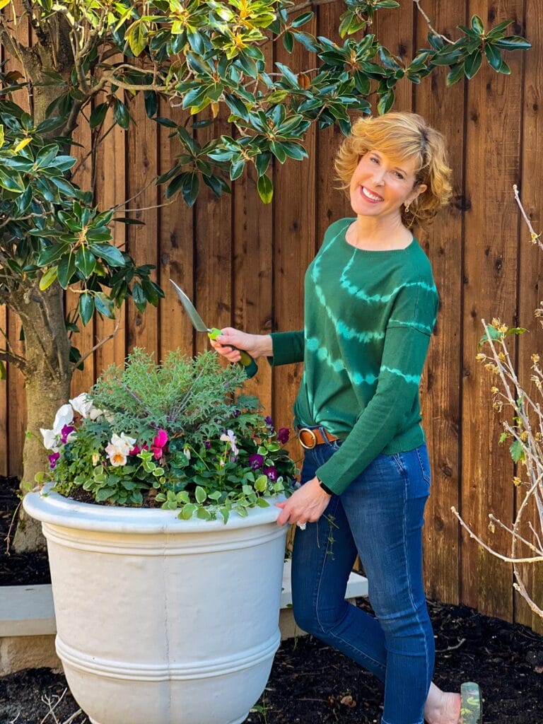 woman over 50 wearing jjill while gardening