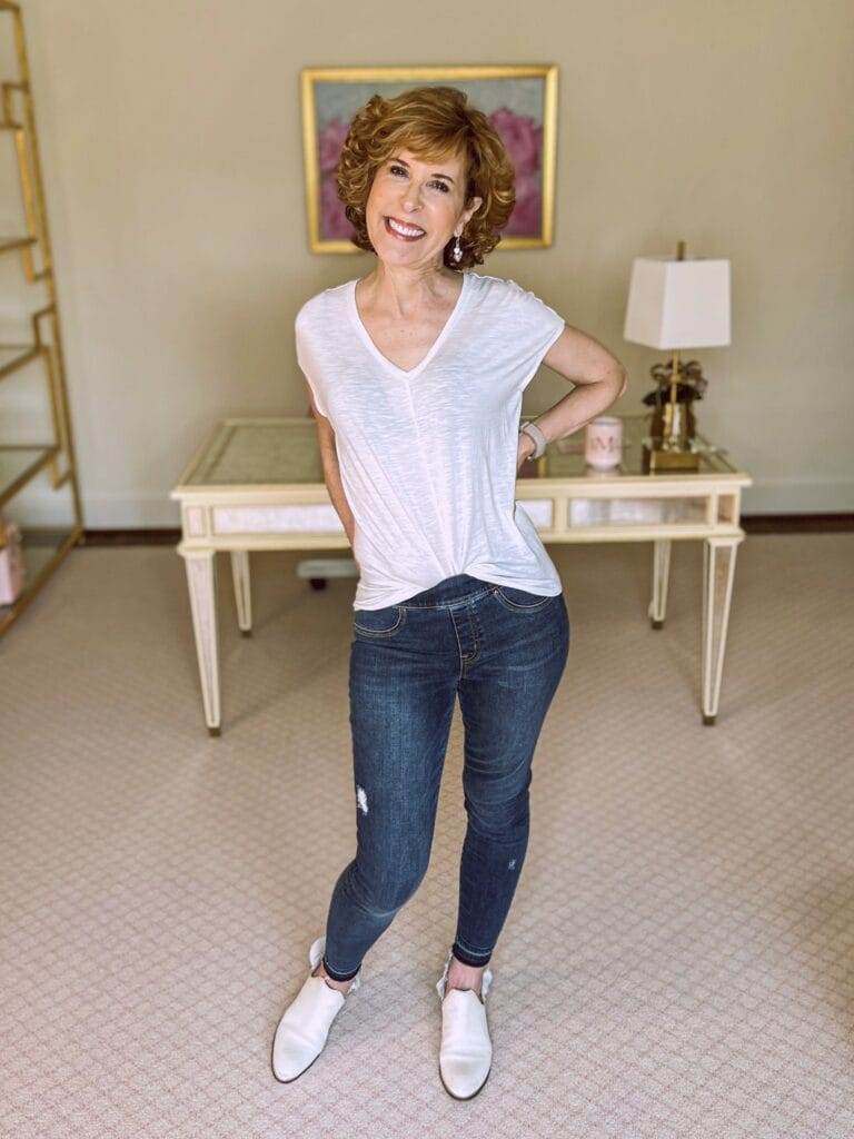 woman over 50 wearing whbm white jetsetter tee