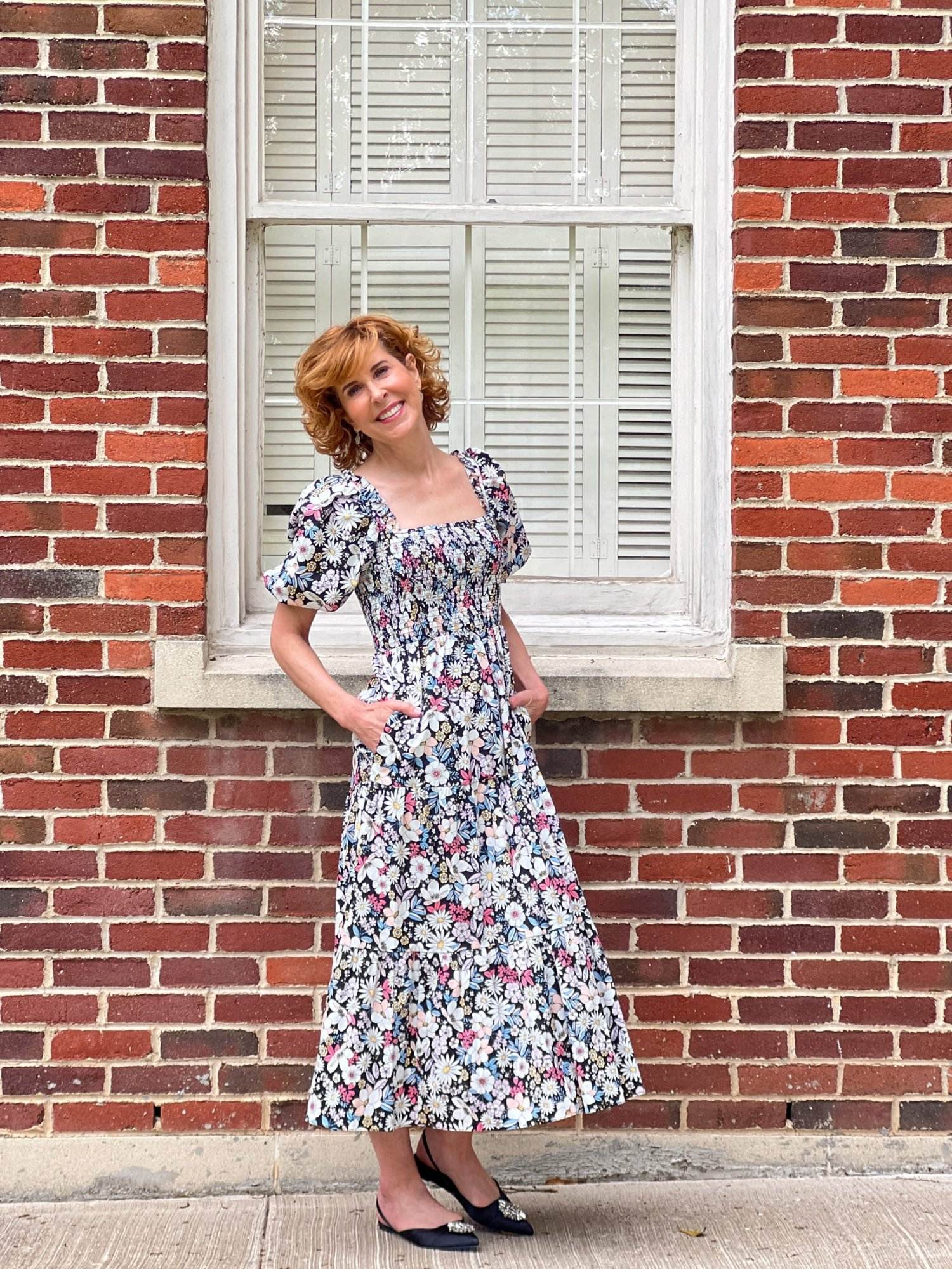 woman wearing Rachel Parcell Smocked Puff Sleeve Midi Dress wondering what to wear to a summer wedding