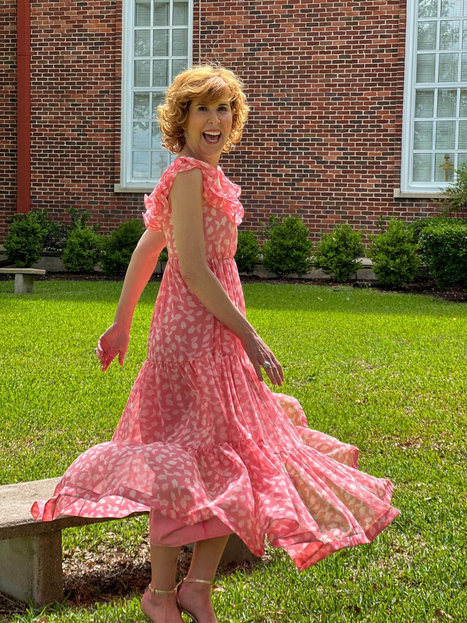 woman over 50 spinning after she decides what to wear to a summer wedding is the Chelsea28 Ruffle Midi Dress from Nordstrom Made Brands