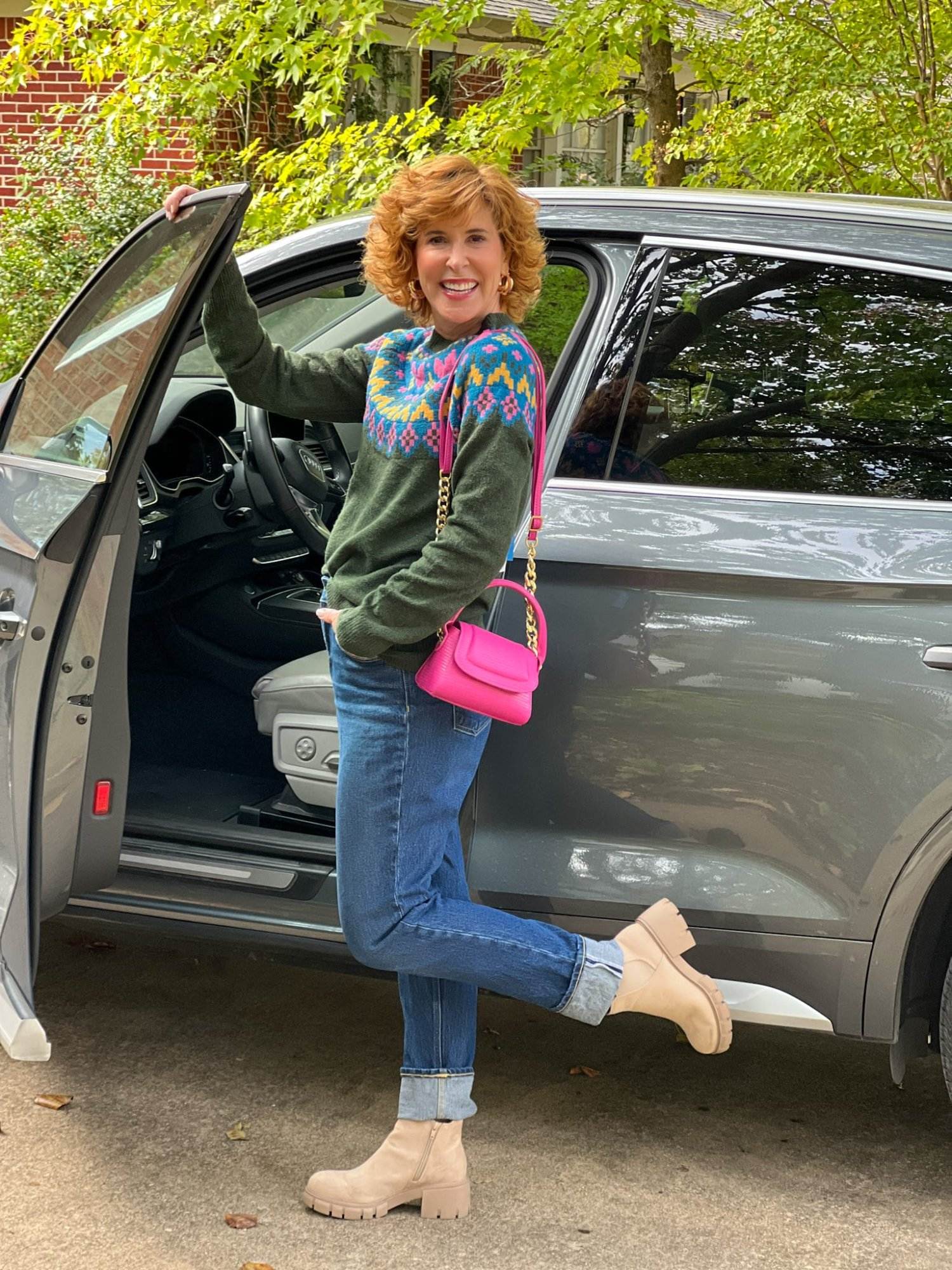 woman standing by car wearing Time and Tru Walmart women's Intarsia Sweater