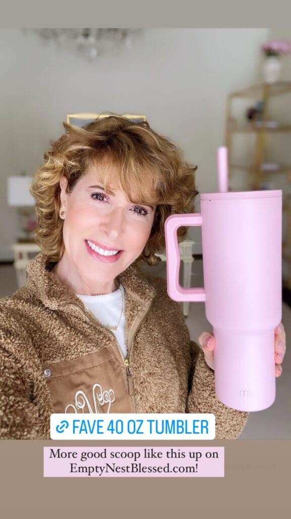 woman holding simple modern 40 oz tumbler in pink