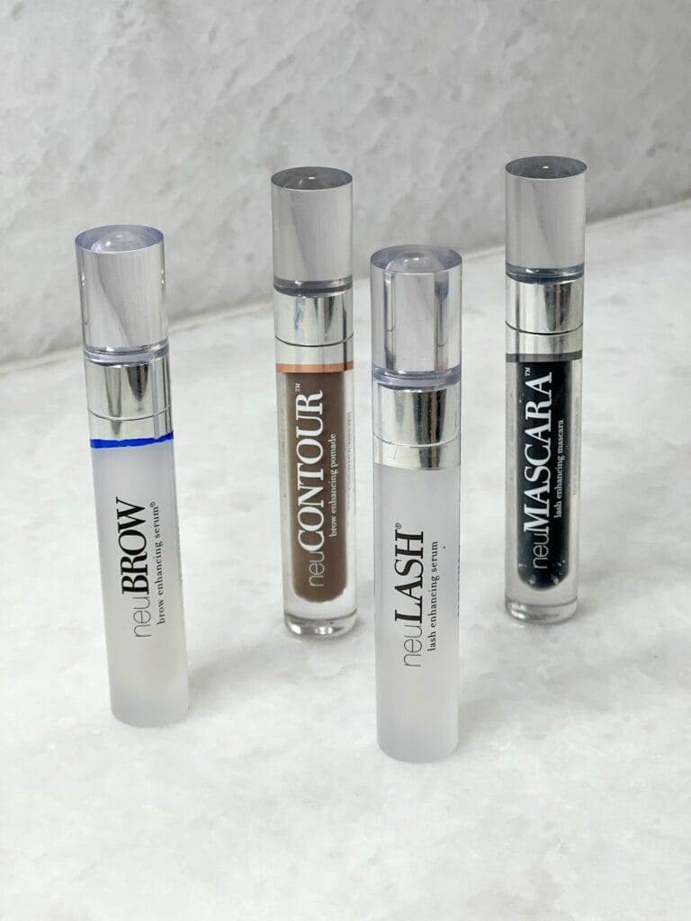 neulash lash enhancing serum, neumascara, neubrow serum, neubrow enhancer products on white counter