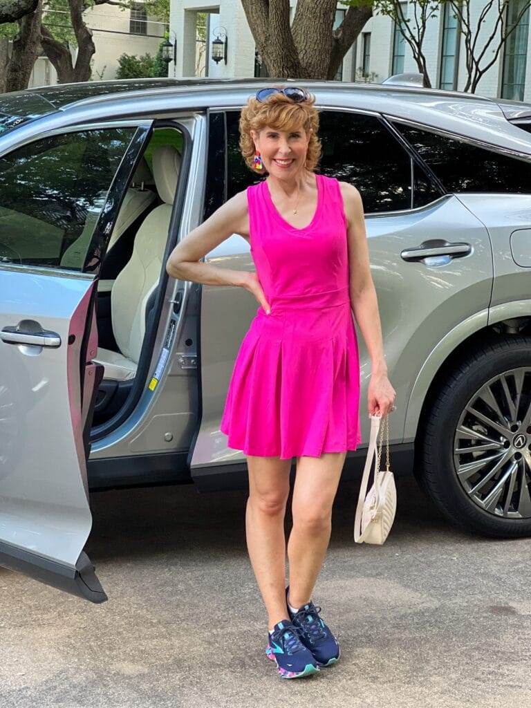 Better Than Every Hot Pink Tennis Dress w/ Shorts on woman getting ready to go on errands standing by her car