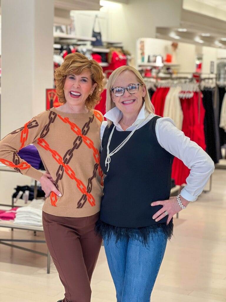 two women posing in a talbots store