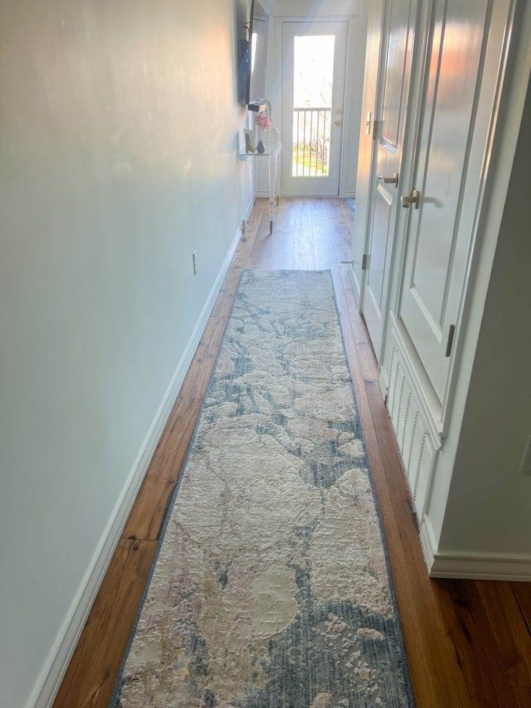 runner in hallway in waco loft after remodel