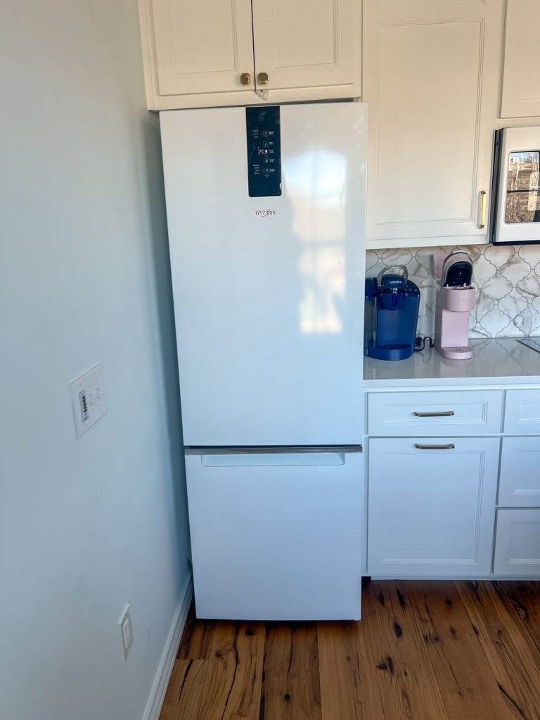 refrigerator 24" in kitchen in waco loft after remodel