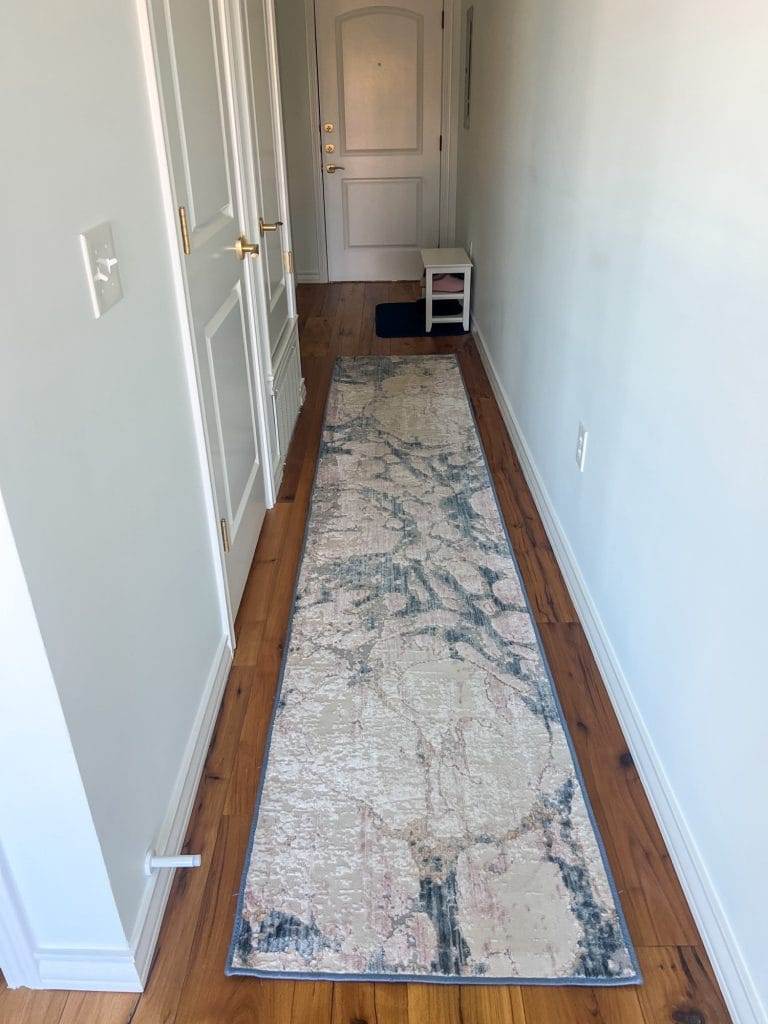 hallway with runner in waco loft after remodel