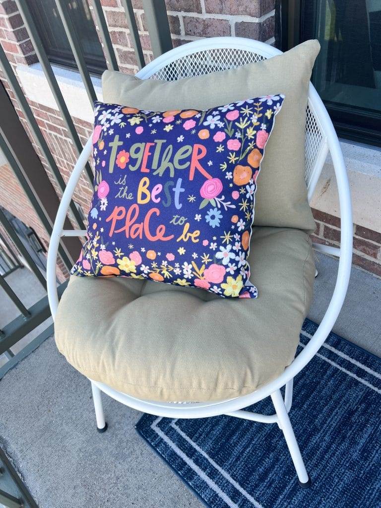 chair on balcony of waco loft after remodel