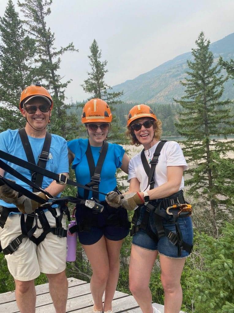 3 people getting ready to zipline in montana