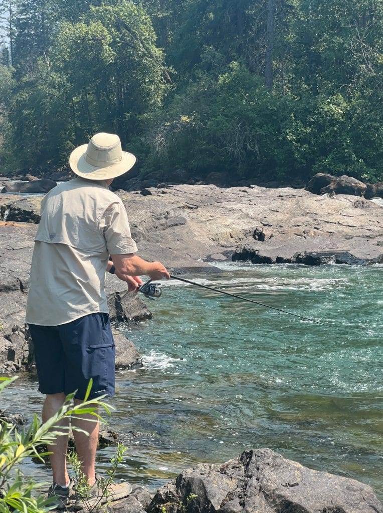 man fly fishing in montana