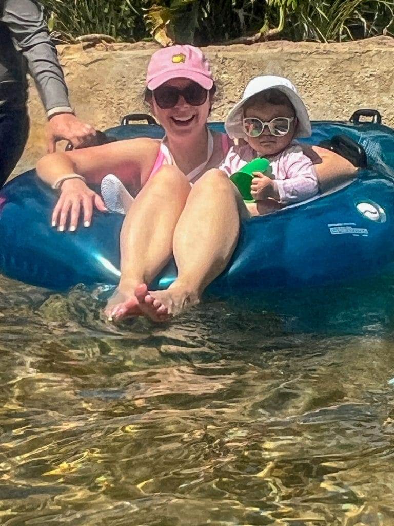 mom and baby on the lazy river at baha mar