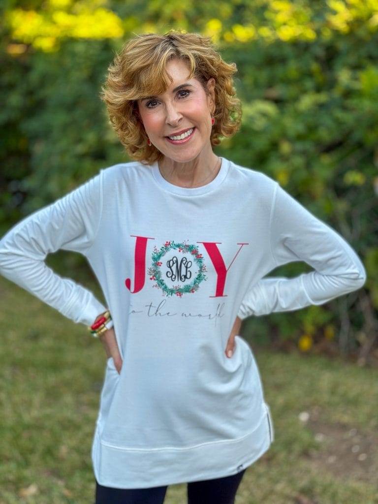 woman over 50 posing in a marleylilly joy tunic outdoors