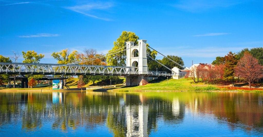 the historic suspension bridge in waco texas in the fall
