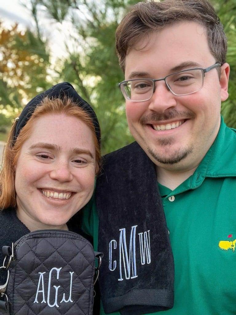 couple holding personalized gifts from marleylilly