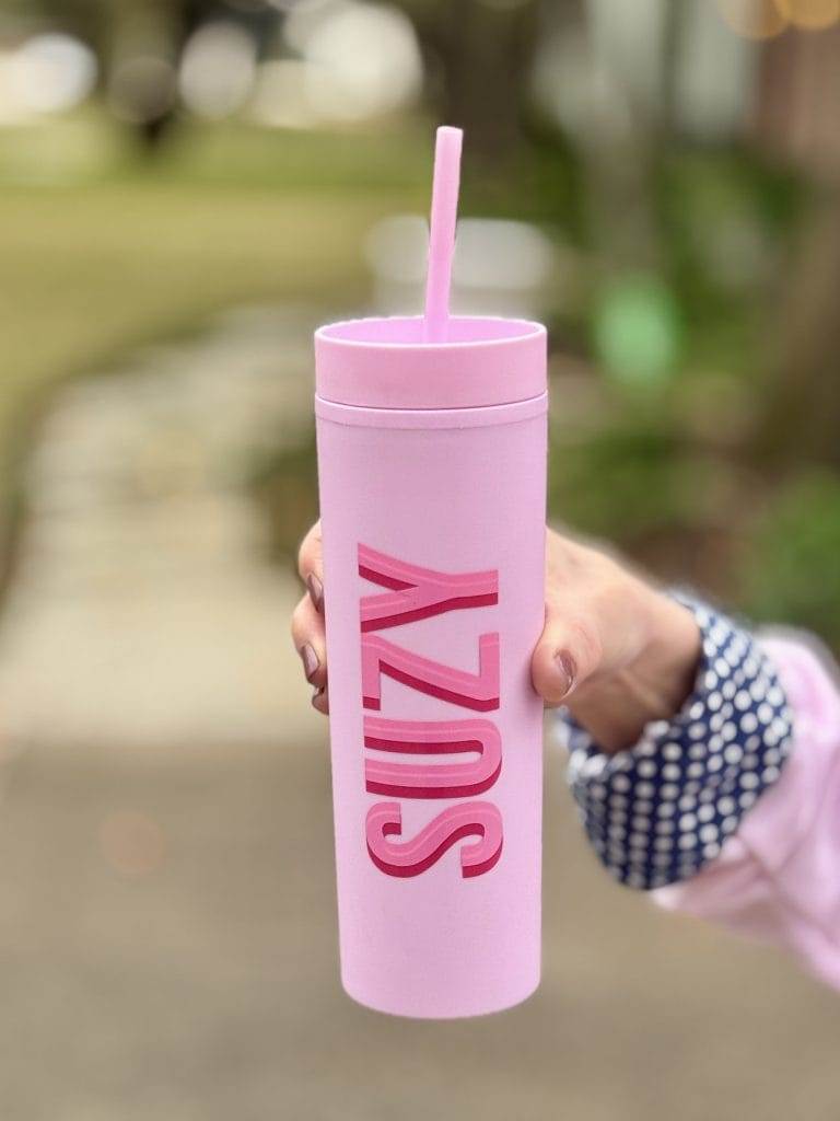 pink with straw water bottle tumbler in pink with name SUZY on it in pink shadow letters