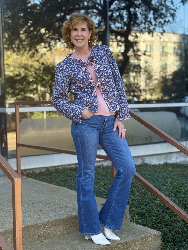 woman wearing quilted jacket tied with bow ties displaying one of the top spring & summer style trends