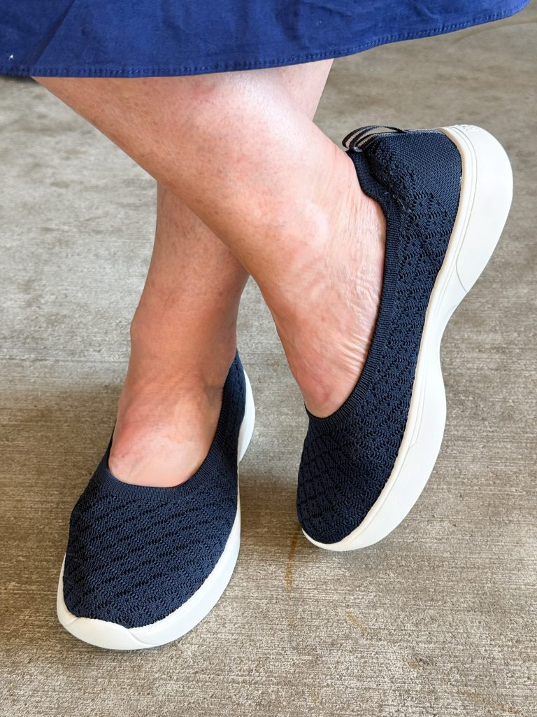 woman wearing keds blisswalk ballet flats in navy